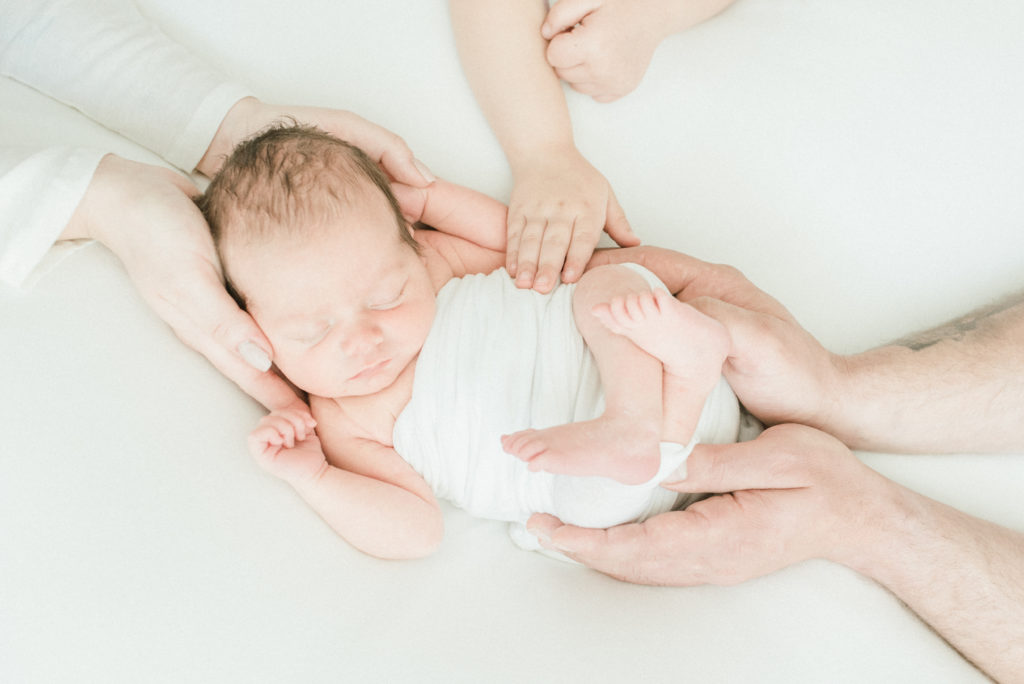 in home newborn session can be easier for siblings