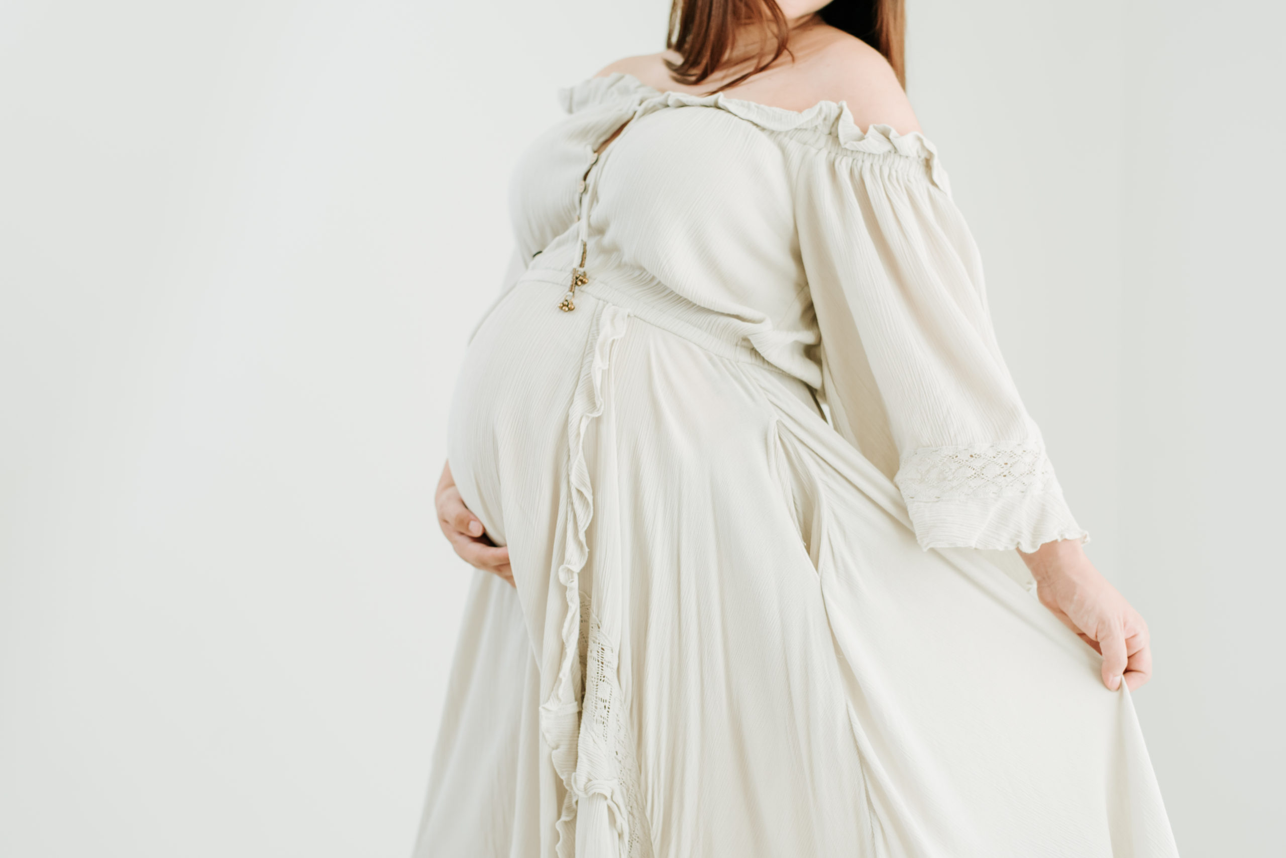 Studio maternity photography has been growing in popularity and very on trend lately.