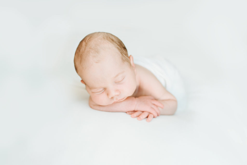in home newborn session with a studio look